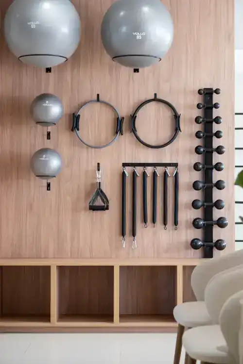 Timber wall of stability balls, Pilates rings and resistance bands